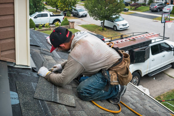 Professional Roof Installation technician working in Camanche, IA